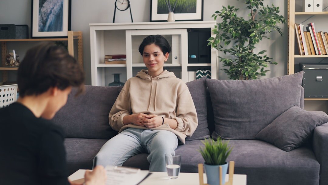 Researcher conducting a survey interview with a respondent