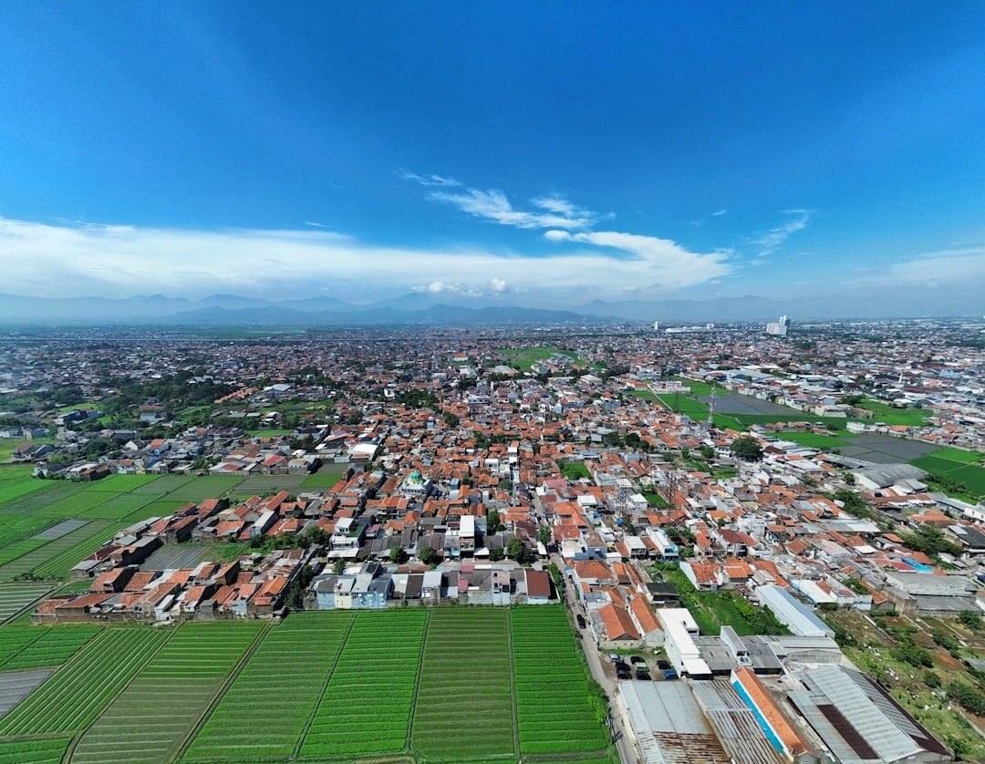 city skyline vs rural fields